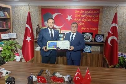 MÜSİAD Eskişehir MHP İl Başkanı Sezer'i ziyaret etti